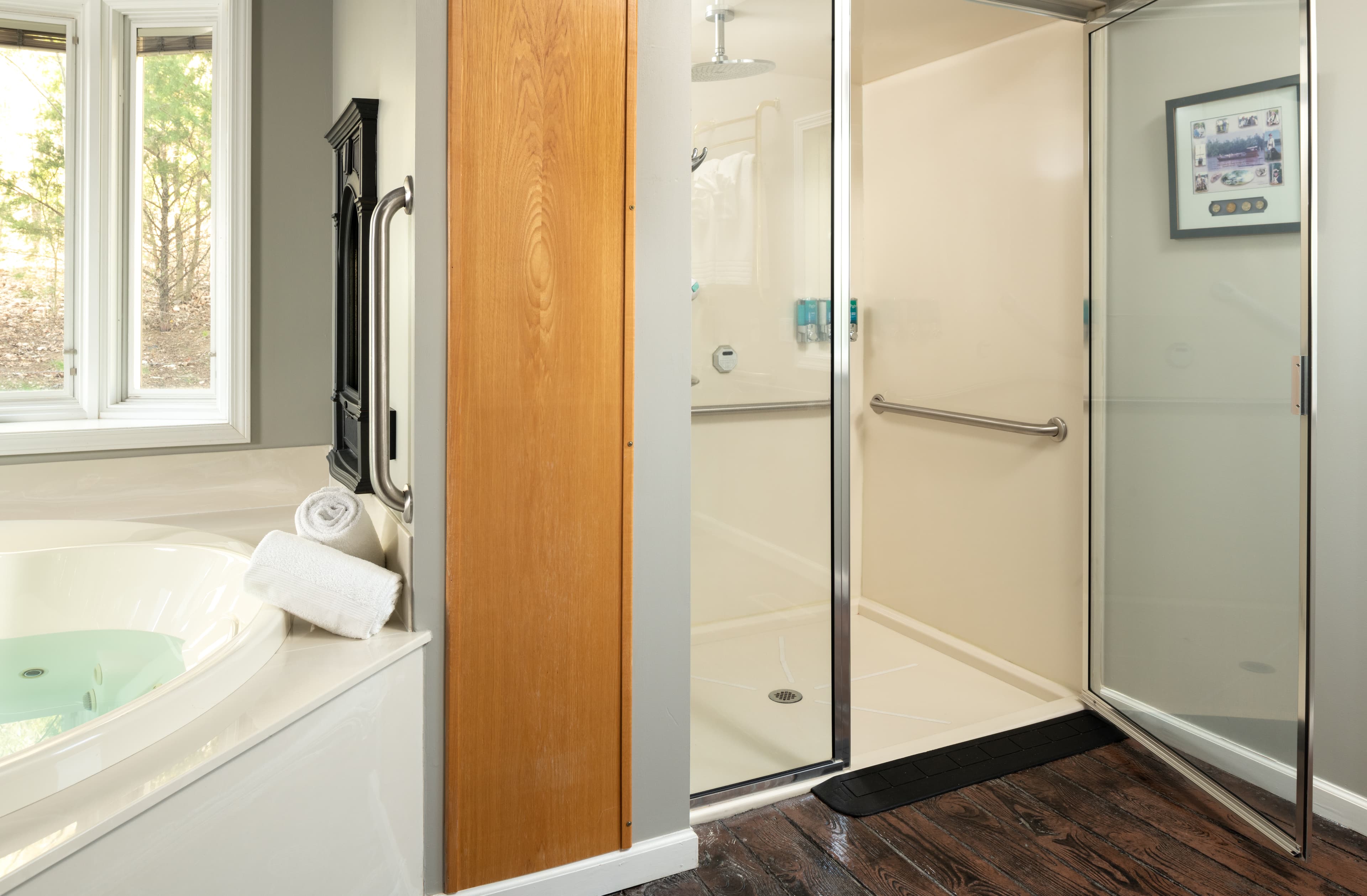 bathroom with tub and shower