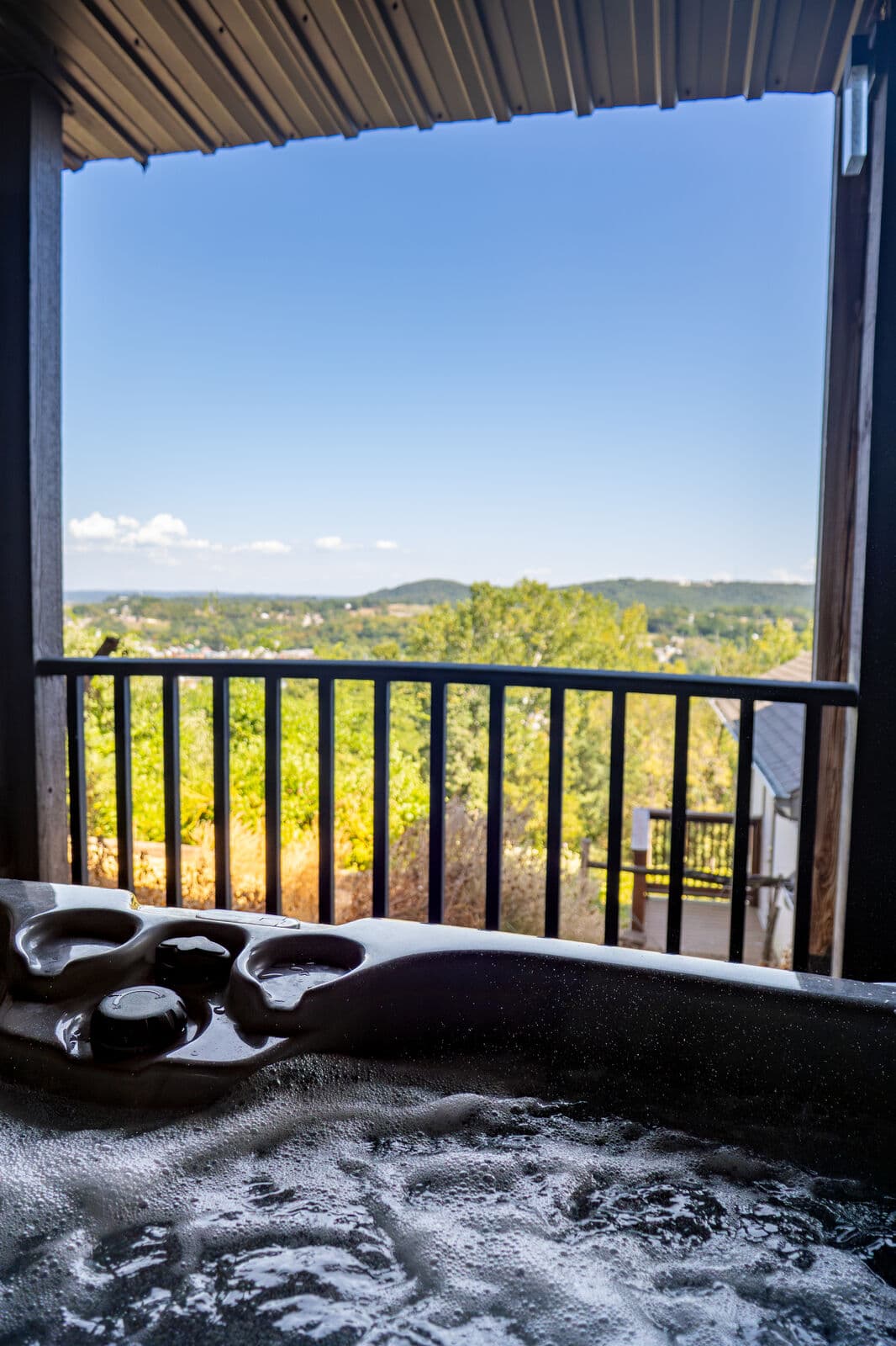 view out of the Chambourcin Suite of the valley overlooking the town of Hermann