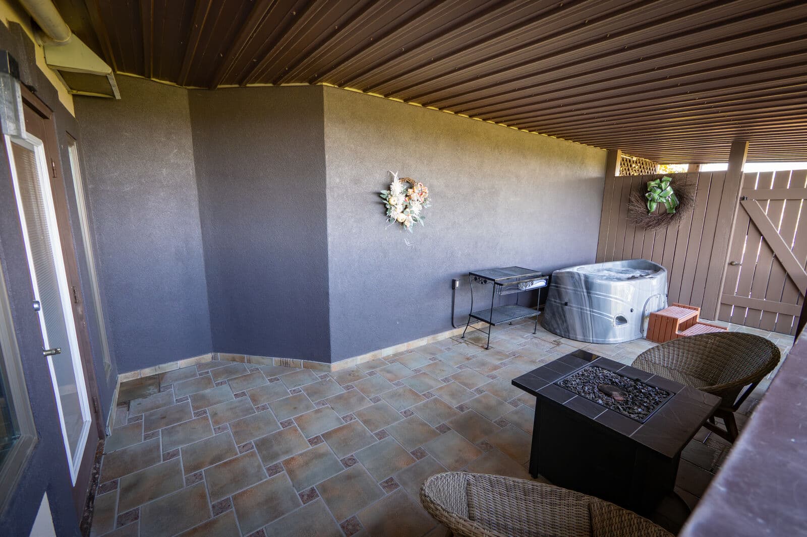 Chambourcin covered patio with fire table