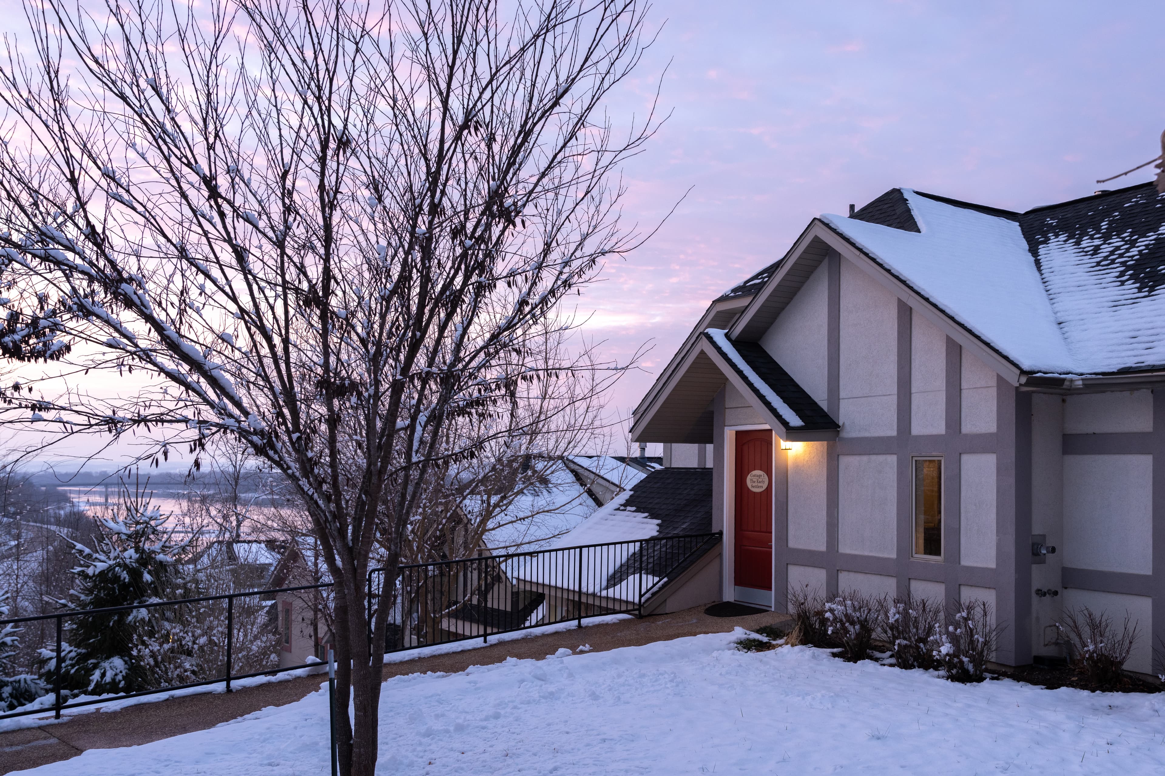 Exterior shot of front of cottage in winter