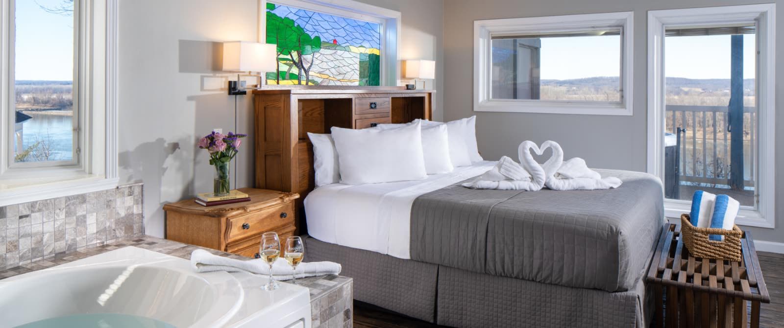 bedroom with king size bed and windows