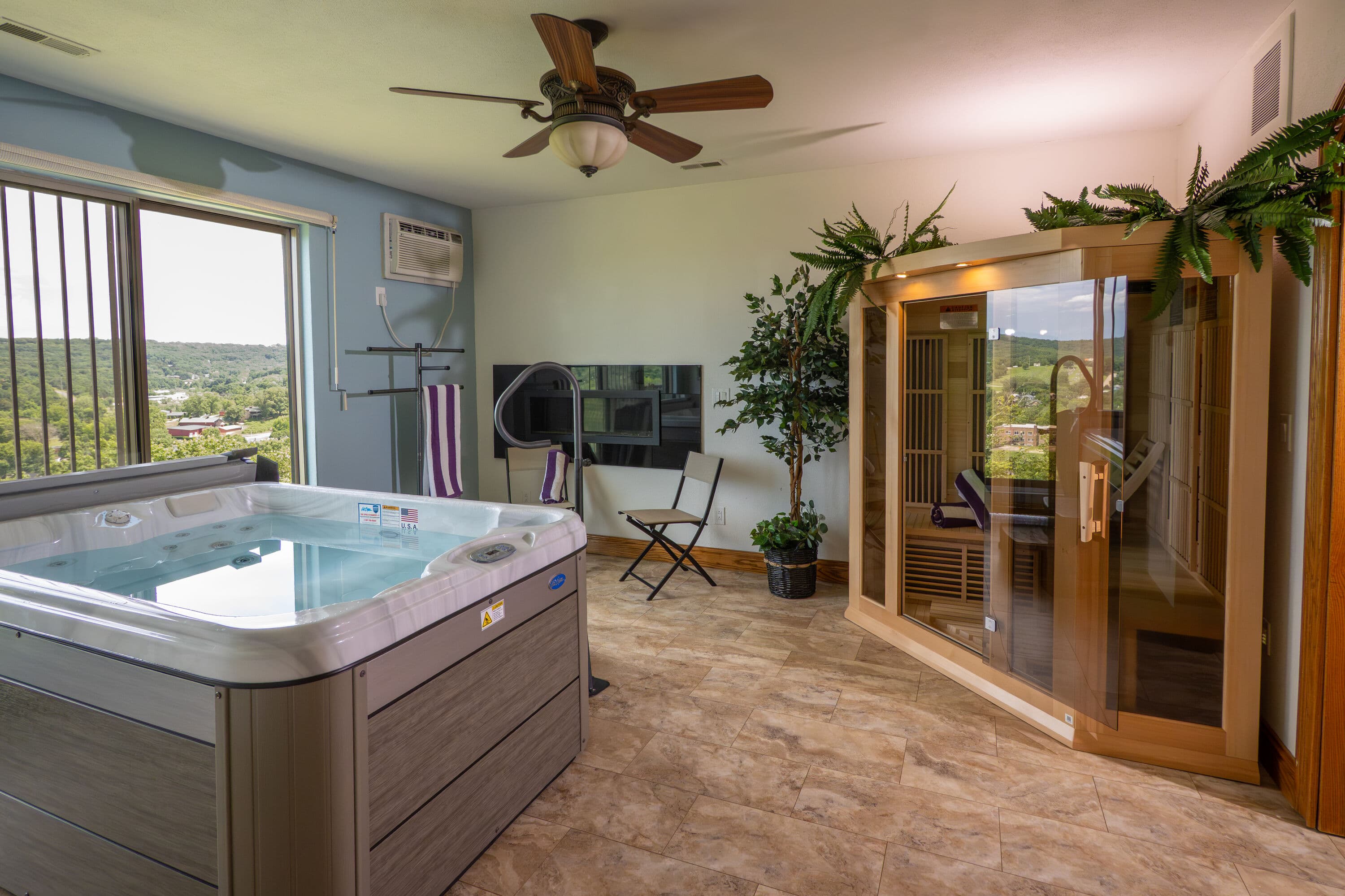 hot tub and infered sauna with sliding glass door behind the hot tub