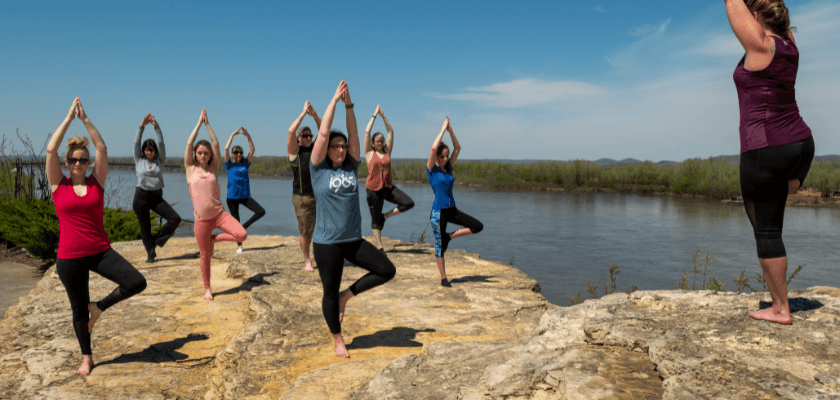 Yoga class overlooking the River Bluff at Hermann Hill.
