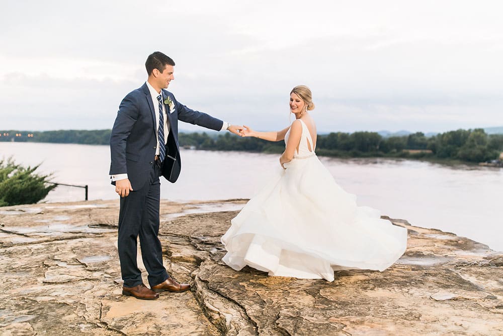 Bride and groom on the river bluff at Hermann Hill wedding venue