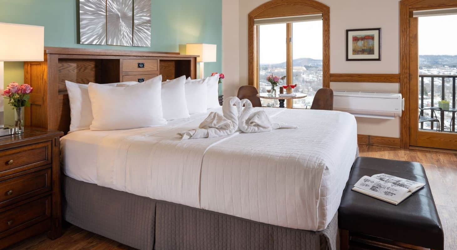 Beautiful and serene Cynthia Vineyard Inn Suite with king bed, matching nightstands and natural light
